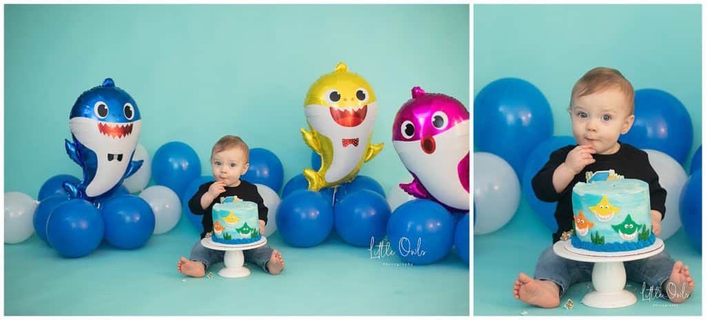 one year baby eating baby shark cake for one year cake smash session