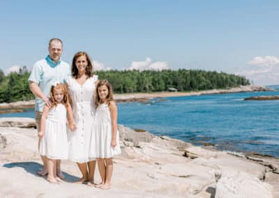 family photo shoot on rocky maine beach