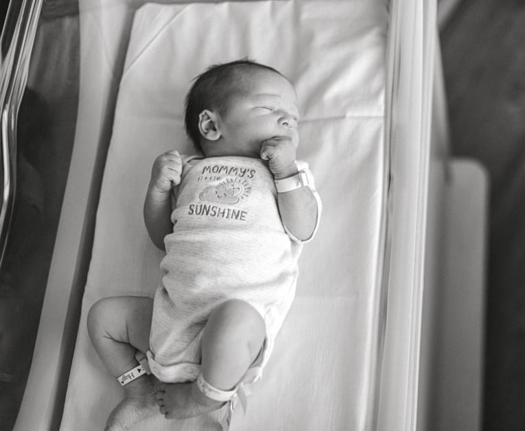 newborn boy in hospital, fresh 48 session, bed, black and white