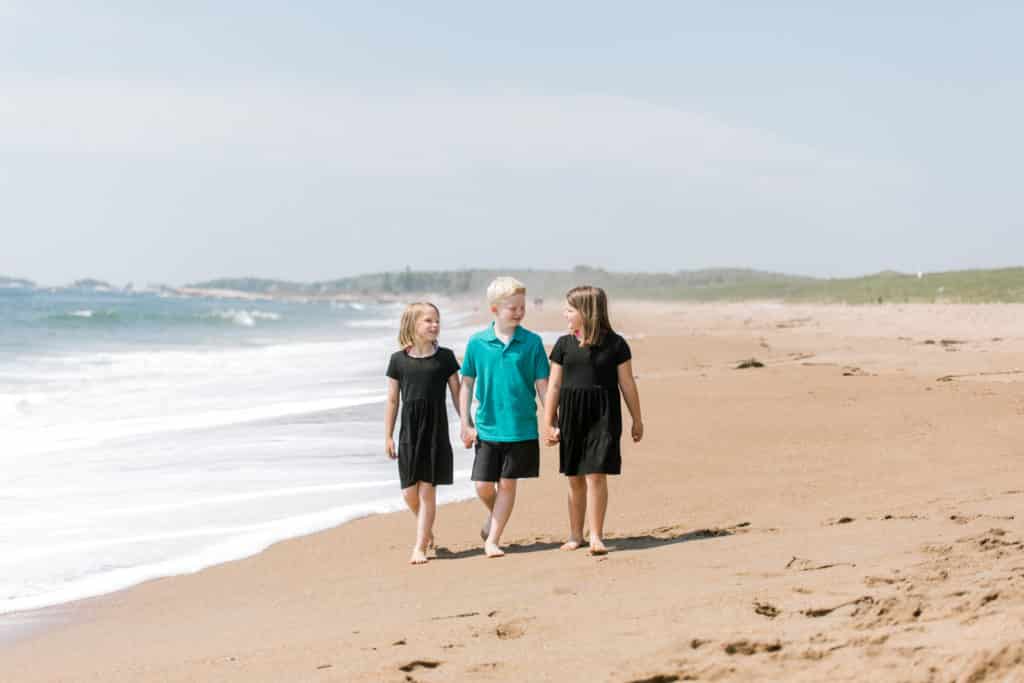 beach photos with kids walking 